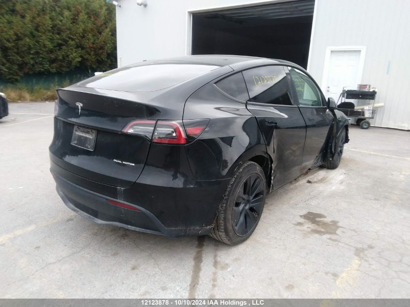 2024 Tesla Model Y VIN: 7SAYGDEE9RF110573 Lot: 12123878