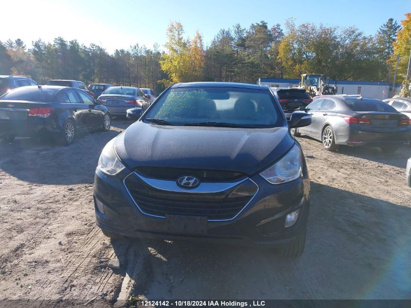 2012 Hyundai Tucson Limited VIN: KM8JUCAC9CU463332 Lot: 12124142