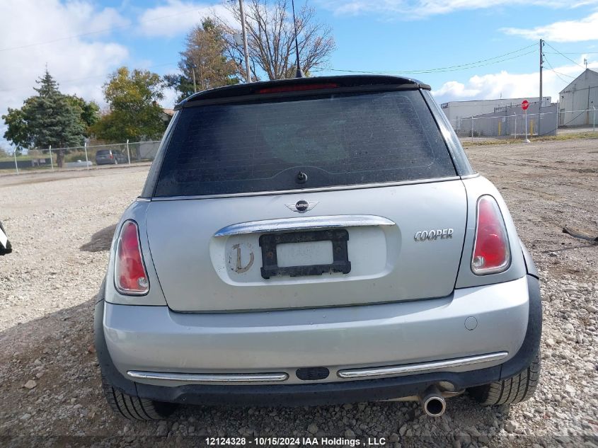 2006 Mini Cooper Hardtop VIN: WMWRC33536TK18056 Lot: 12124328