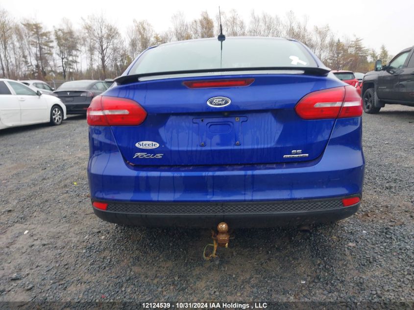 2015 Ford Focus Se VIN: 1FADP3F29FL290596 Lot: 12124539