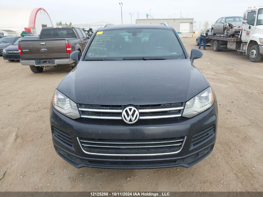 2014 Volkswagen Touareg VIN: WVGDP9BP9ED007018 Lot: 12125288