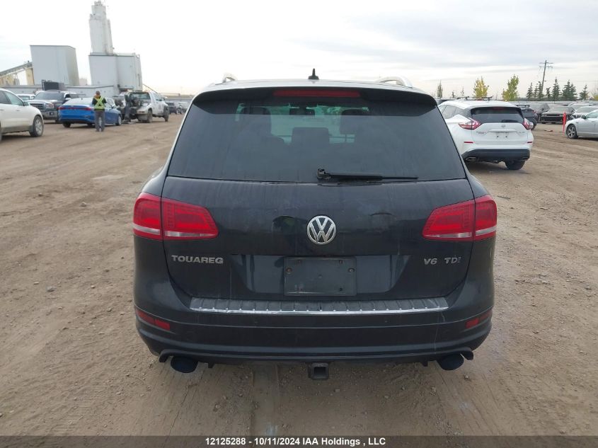 2014 Volkswagen Touareg VIN: WVGDP9BP9ED007018 Lot: 12125288