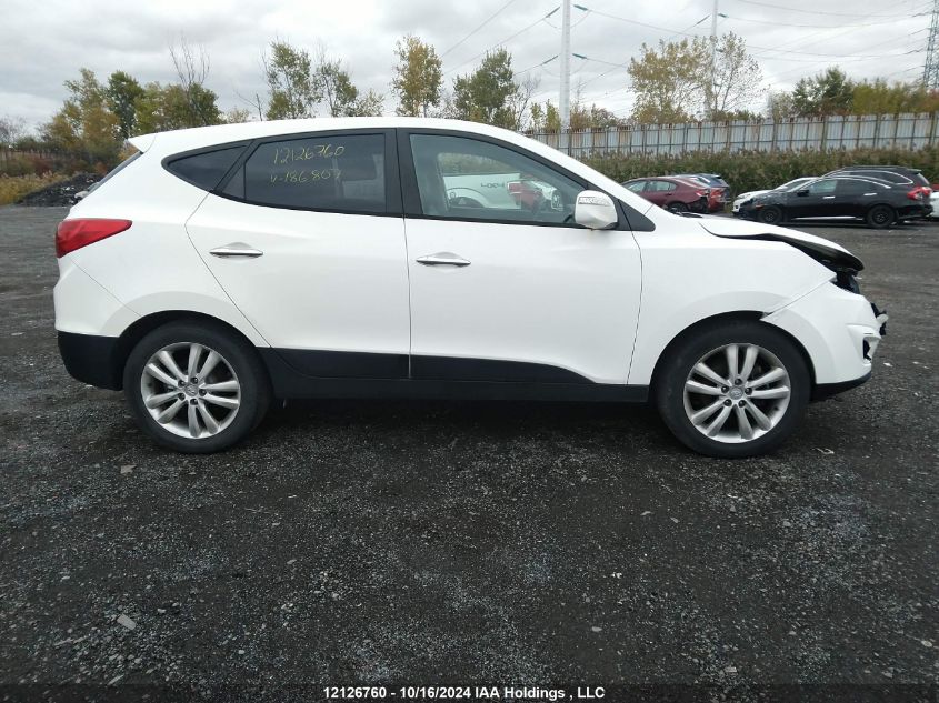 2011 Hyundai Tucson VIN: KM8JUCAC5BU186807 Lot: 12126760