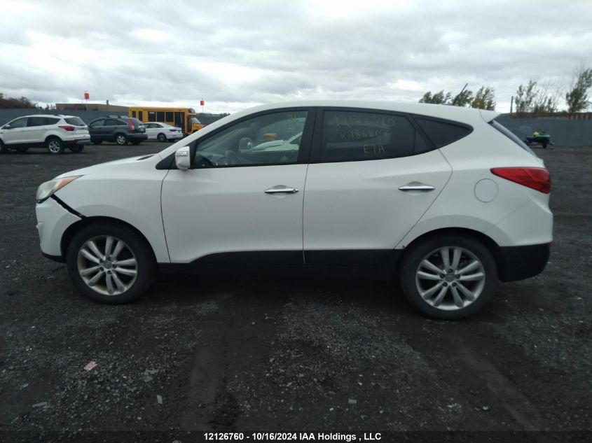 2011 Hyundai Tucson VIN: KM8JUCAC5BU186807 Lot: 12126760