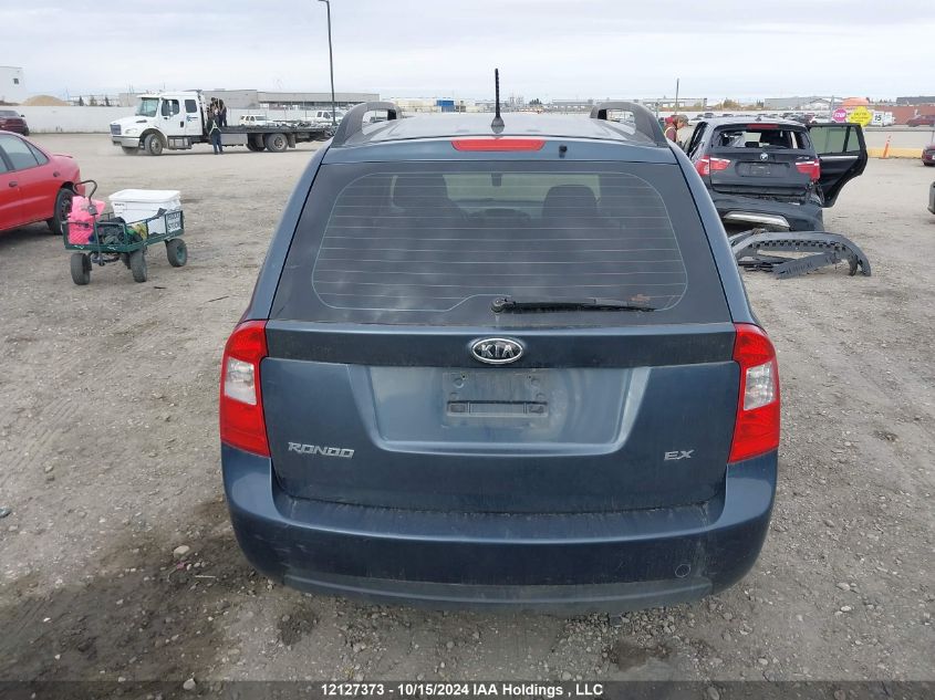 2009 Kia Rondo VIN: KNAFG528897280905 Lot: 12127373