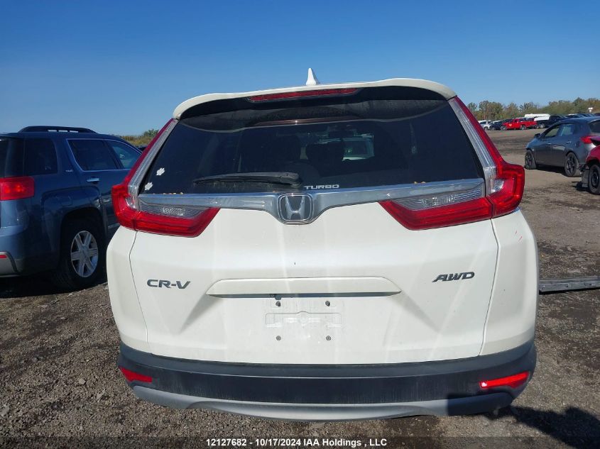 2018 Honda Cr-V VIN: 2HKRW2H56JH140379 Lot: 12127682