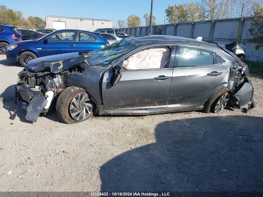 2018 Honda Civic Hatchback VIN: SHHFK7H29JU306585 Lot: 12128432