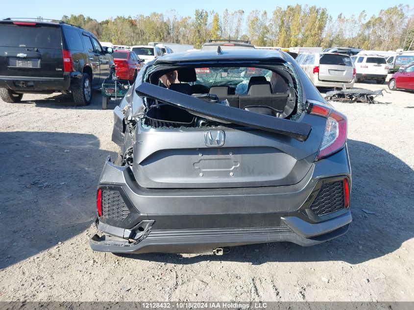 2018 Honda Civic Hatchback VIN: SHHFK7H29JU306585 Lot: 12128432