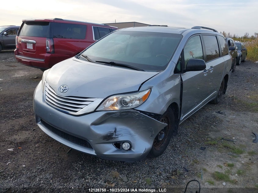 2014 Toyota Sienna Xle 7 Passenger VIN: 5TDDK3DC2ES087597 Lot: 12128750