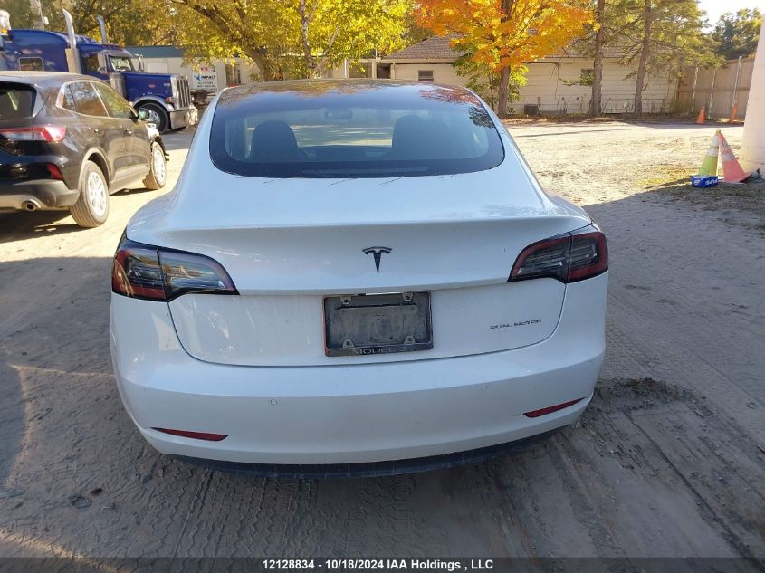 2022 Tesla Model 3 VIN: 5YJ3E1EB1NF314554 Lot: 12128834