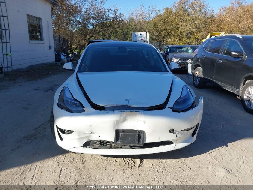 2022 Tesla Model 3 VIN: 5YJ3E1EB1NF314554 Lot: 12128834