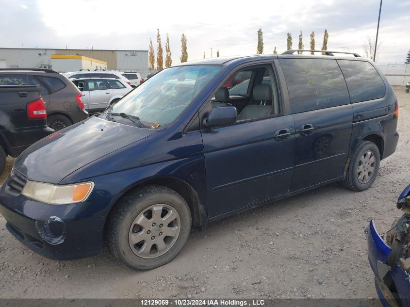 2004 Honda Odyssey VIN: 2HKRL18934H003717 Lot: 12129059