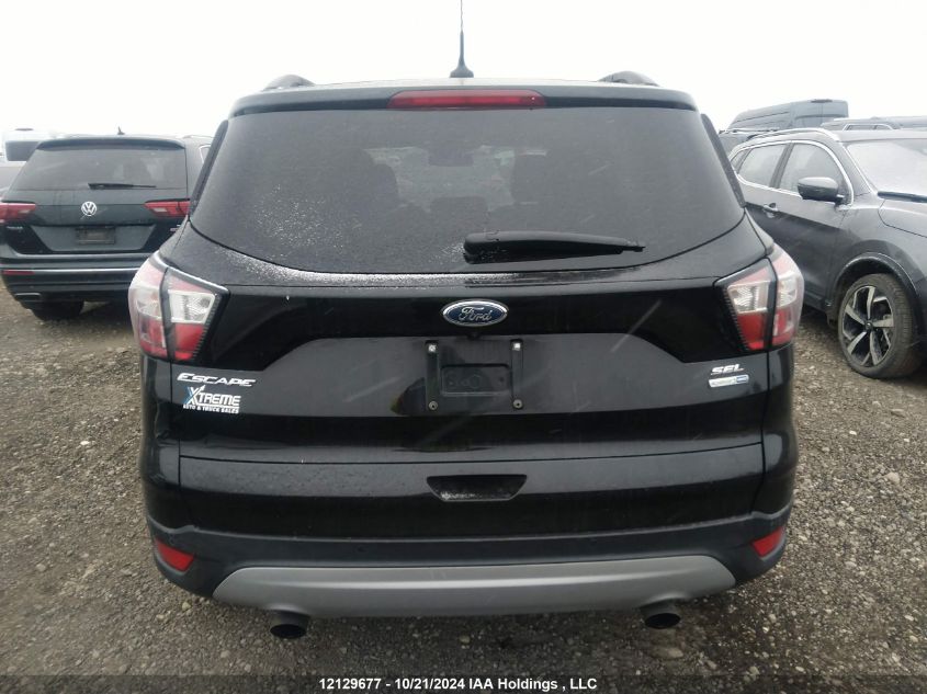 2018 Ford Escape Sel VIN: 1FMCU9H93JUC14172 Lot: 12129677