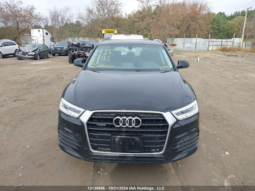 2016 Audi Q3 VIN: WA1GFCFS0GR001057 Lot: 12130656