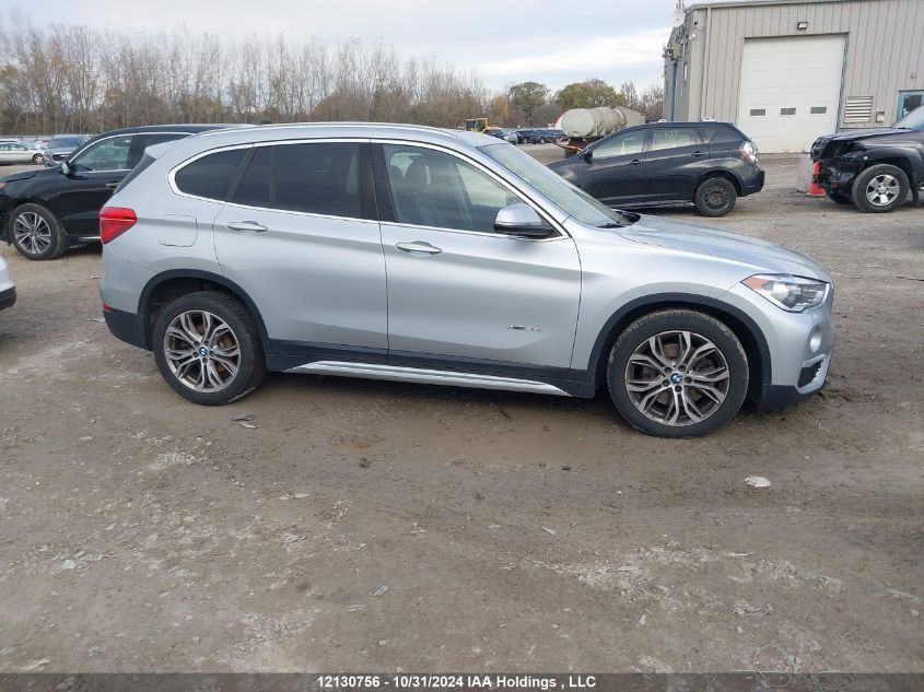 2017 BMW X1 VIN: WBXHT3C39H5F74330 Lot: 12130756