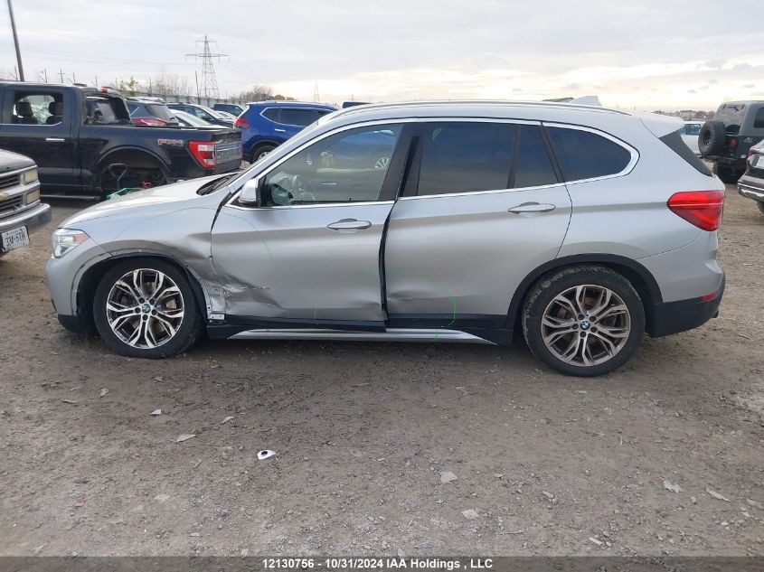 2017 BMW X1 VIN: WBXHT3C39H5F74330 Lot: 12130756