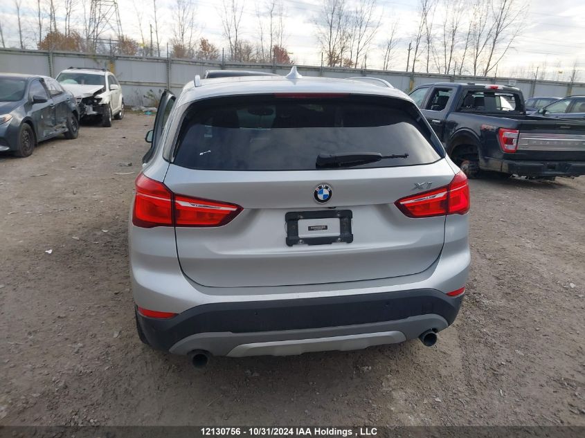 2017 BMW X1 VIN: WBXHT3C39H5F74330 Lot: 12130756