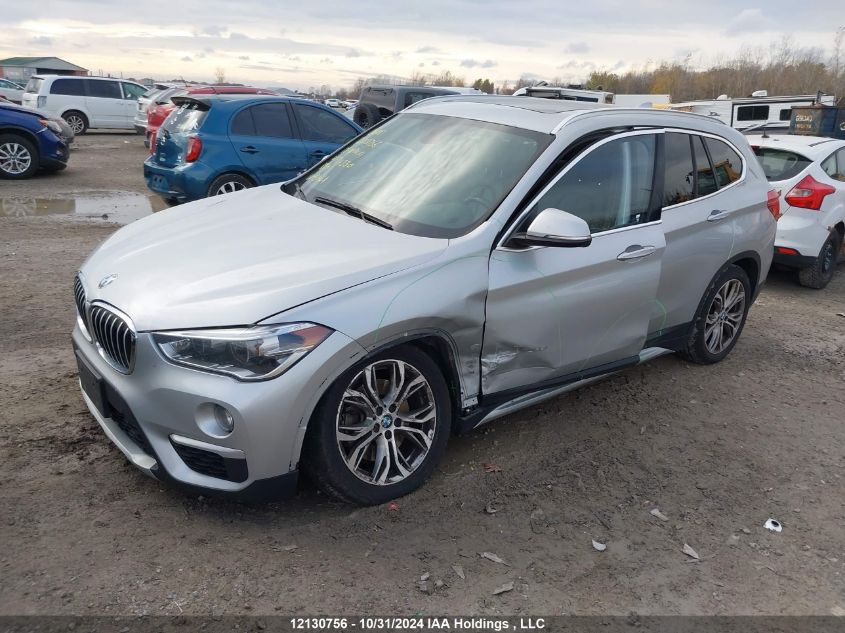 2017 BMW X1 VIN: WBXHT3C39H5F74330 Lot: 12130756