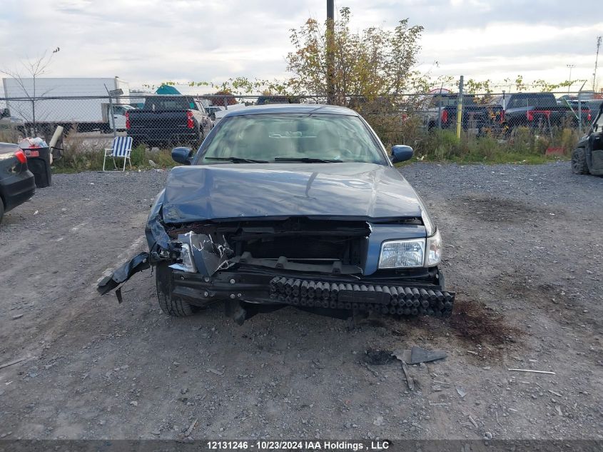 2009 Mercury Grand Marquis VIN: 2MEHM75VX9X631825 Lot: 12131246