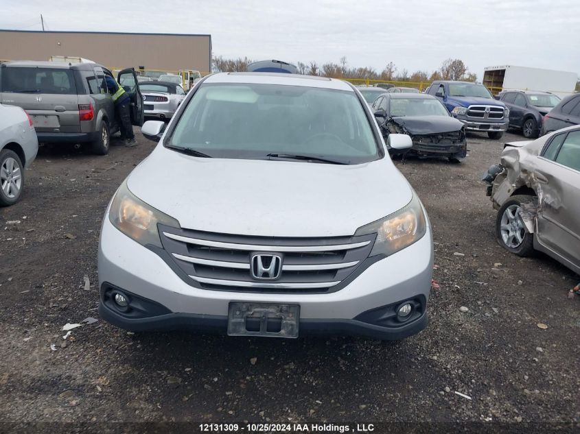 2014 Honda Cr-V VIN: 2HKRM3H52EH003313 Lot: 12131309