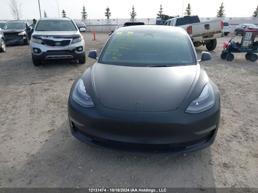 2023 Tesla Model 3 VIN: 5YJ3E1EC9PF404708 Lot: 12131474