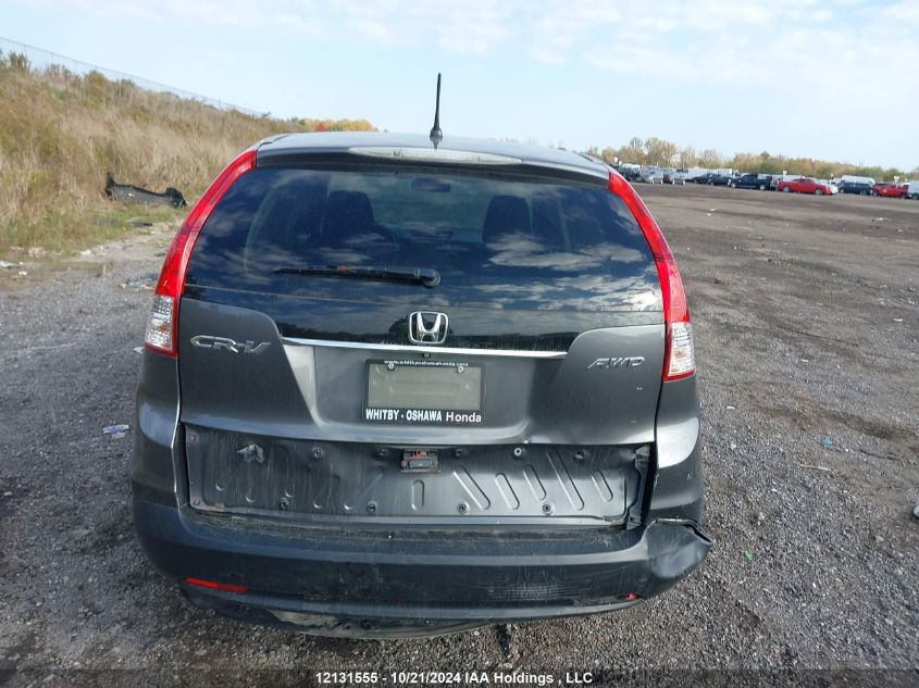 2014 Honda Cr-V VIN: 2HKRM4H35EH134059 Lot: 12131555