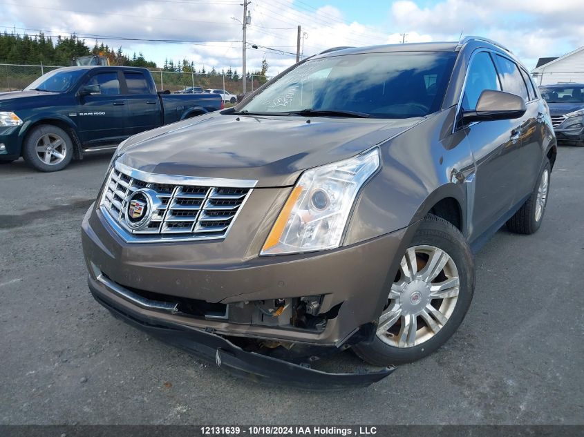 2014 Cadillac Srx VIN: 3GYFNEE31ES562754 Lot: 12131639