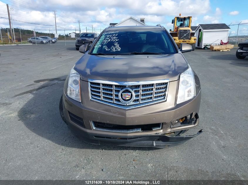 2014 Cadillac Srx VIN: 3GYFNEE31ES562754 Lot: 12131639