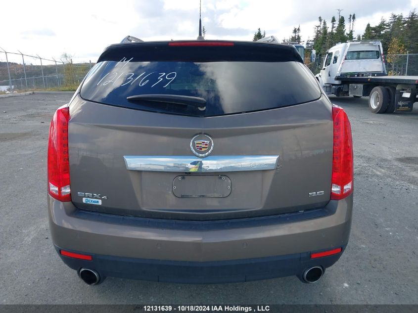 2014 Cadillac Srx VIN: 3GYFNEE31ES562754 Lot: 12131639