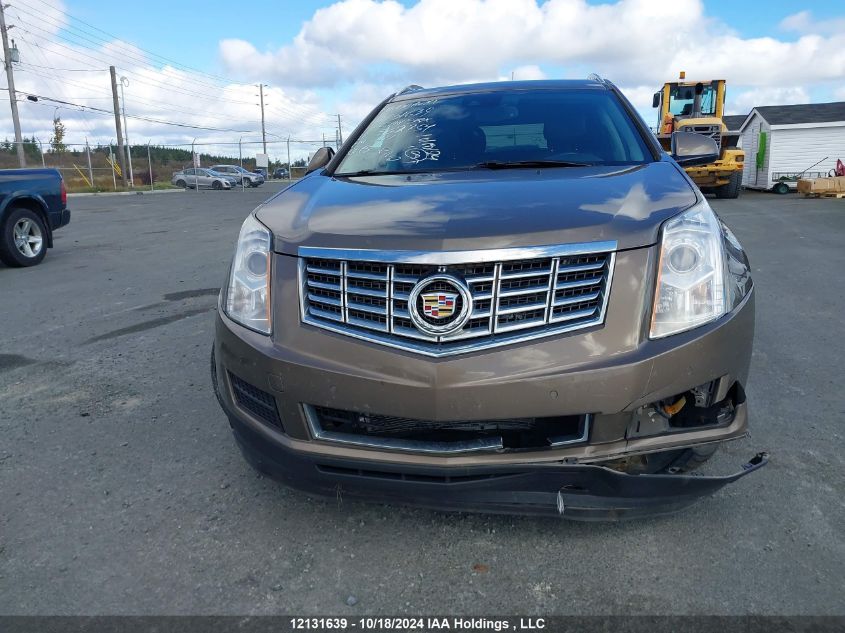 2014 Cadillac Srx VIN: 3GYFNEE31ES562754 Lot: 12131639