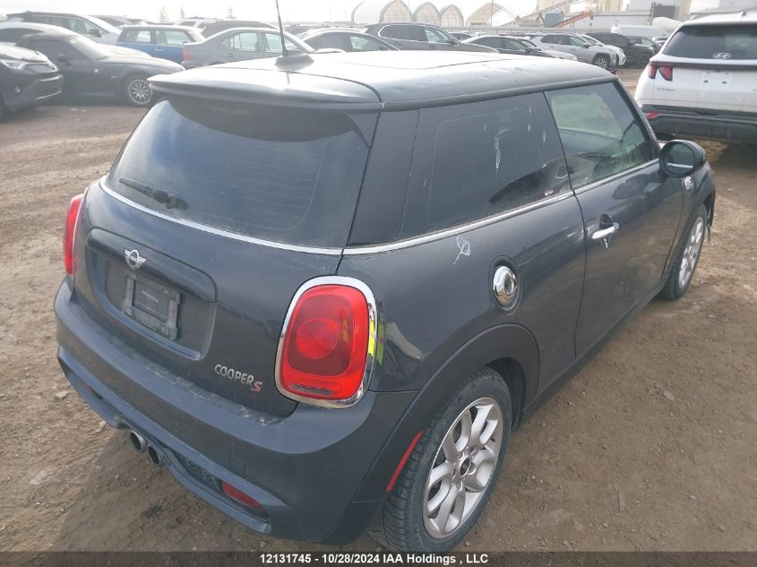 2014 Mini Cooper Hardtop VIN: WMWXM7C57ET731384 Lot: 12131745