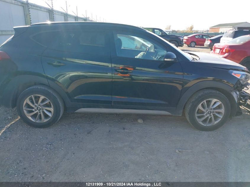 2018 Hyundai Tucson Se 2.0L VIN: KM8J3CA42JU723286 Lot: 12131909