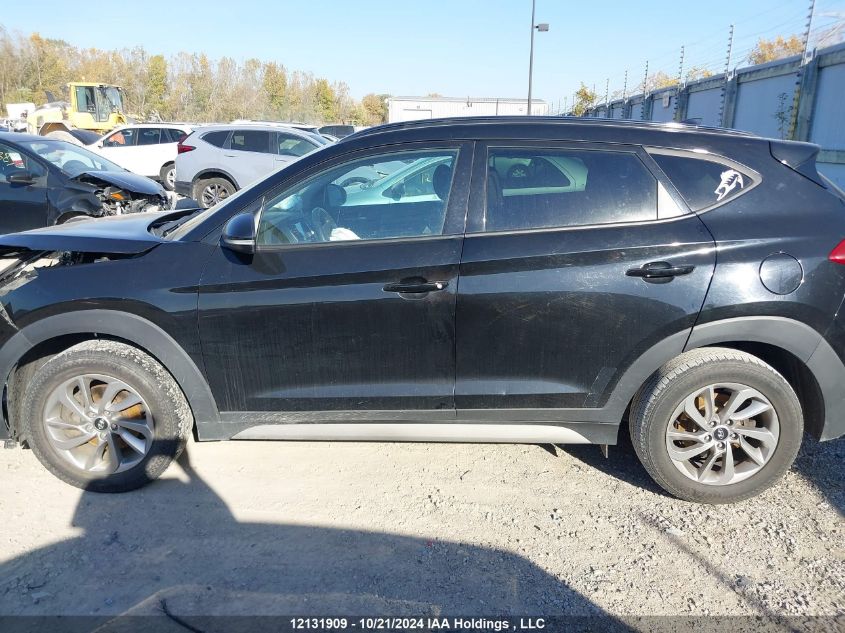 2018 Hyundai Tucson Se 2.0L VIN: KM8J3CA42JU723286 Lot: 12131909