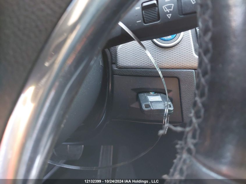 2011 BMW 3 Series VIN: WBAKG1C59BE617966 Lot: 12132399