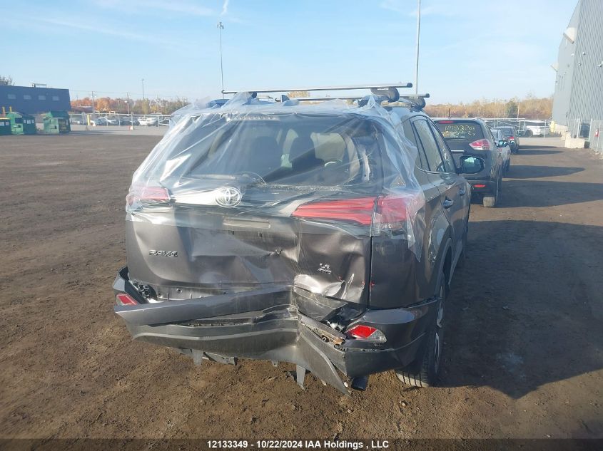 2018 Toyota Rav4 Le VIN: 2T3BFREV3JW725170 Lot: 12133349