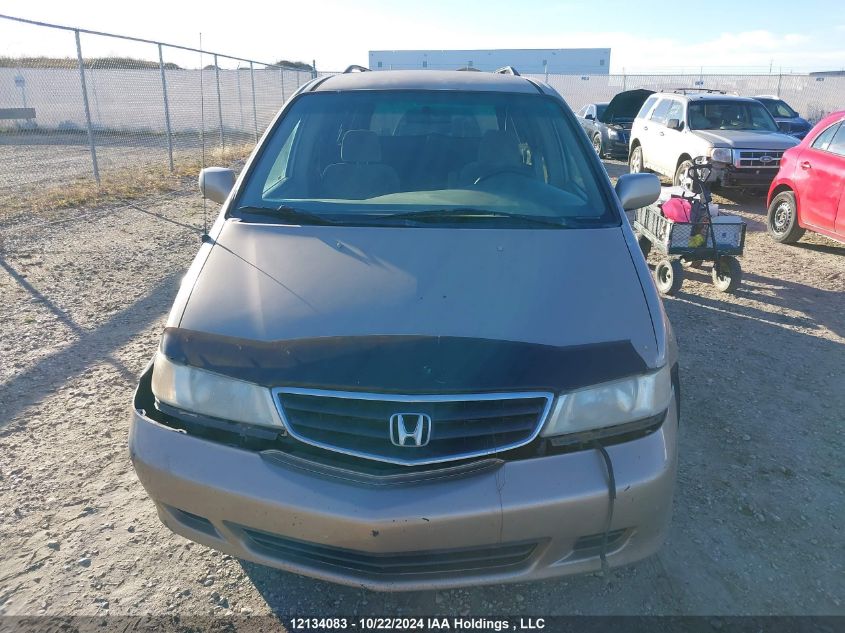 2002 Honda Odyssey VIN: 2HKRL18652H005066 Lot: 12134083