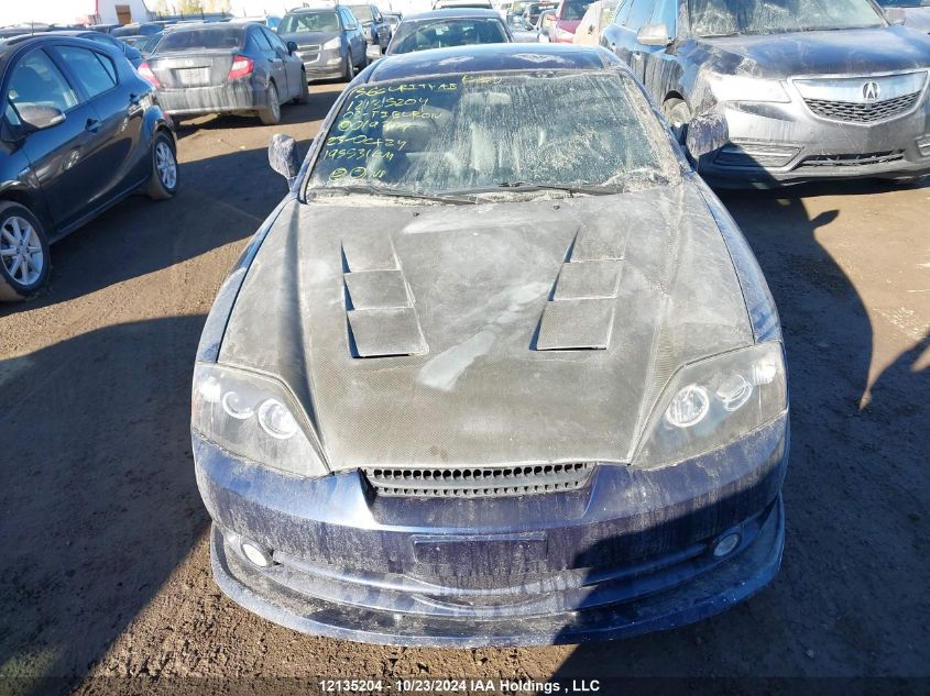 2003 Hyundai Tiburon VIN: KMHHN65D33U019797 Lot: 12135204