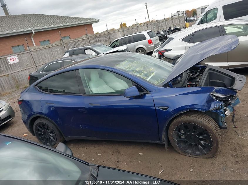 2021 Tesla Model Y VIN: 5YJYGAEE1MF157343 Lot: 12135310