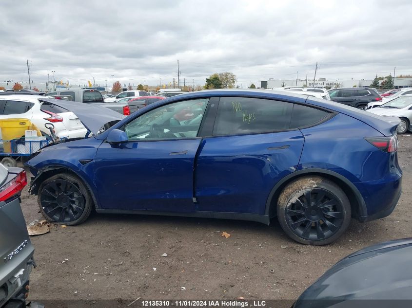 2021 Tesla Model Y VIN: 5YJYGAEE1MF157343 Lot: 12135310