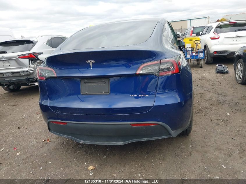 2021 Tesla Model Y VIN: 5YJYGAEE1MF157343 Lot: 12135310