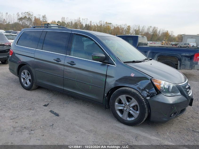 2010 Honda Odyssey VIN: 5FNRL3H89AB504060 Lot: 12135641