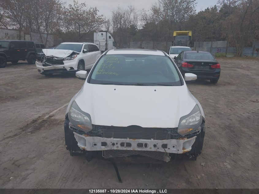 2013 Ford Focus Titanium VIN: 1FADP3J26DL101018 Lot: 12135887