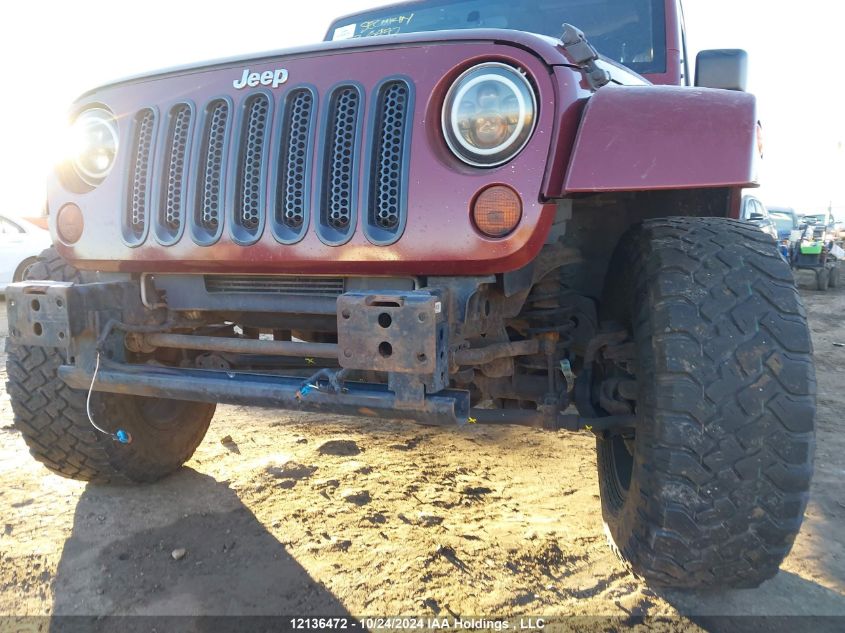 2007 Jeep Wrangler Unlimited Sahara VIN: 1J8GA59167L191512 Lot: 12136472