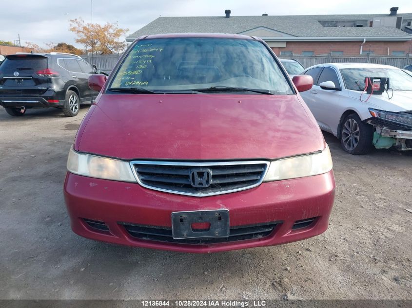 2003 Honda Odyssey VIN: 2HKRL18933H013419 Lot: 12136844