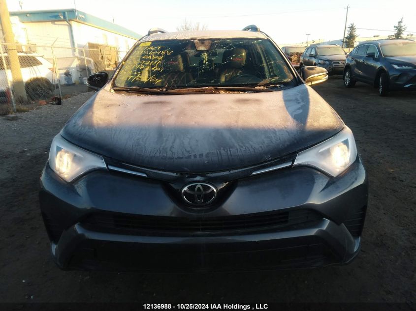 2018 Toyota Rav4 Le VIN: 2T3BFREVXJW697111 Lot: 12136988