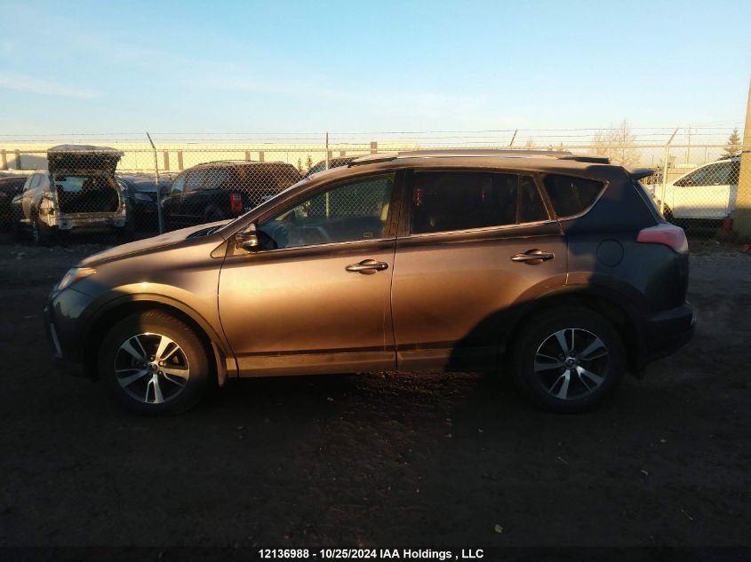 2018 Toyota Rav4 Le VIN: 2T3BFREVXJW697111 Lot: 12136988