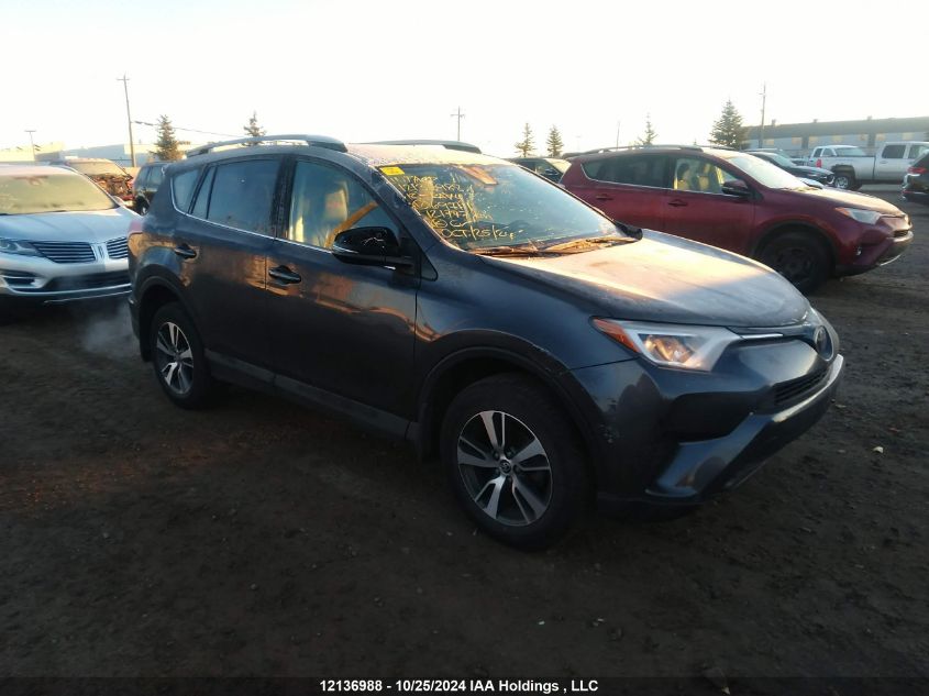 2018 Toyota Rav4 Le VIN: 2T3BFREVXJW697111 Lot: 12136988