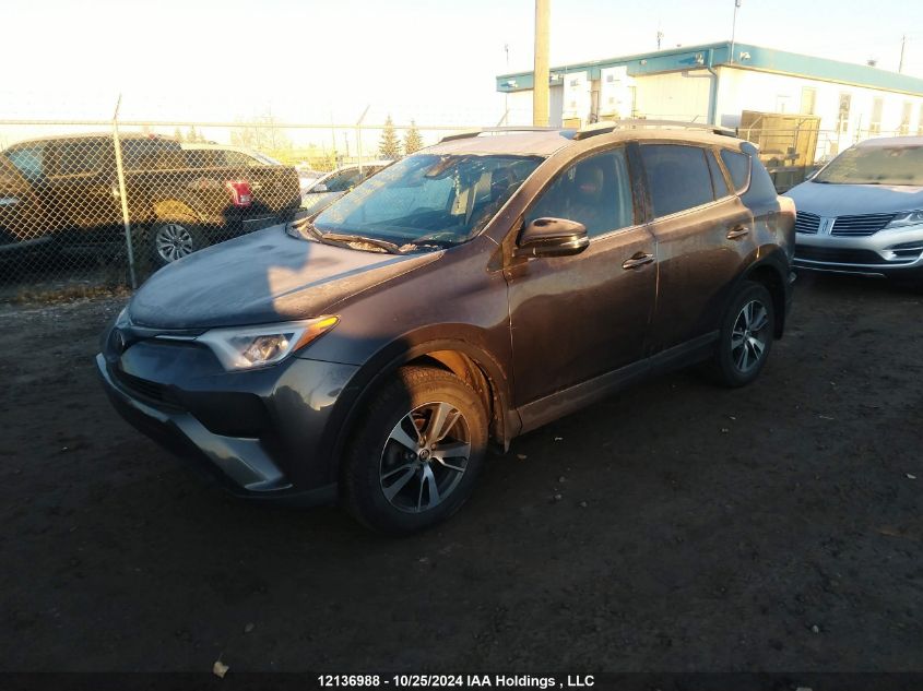 2018 Toyota Rav4 Le VIN: 2T3BFREVXJW697111 Lot: 12136988