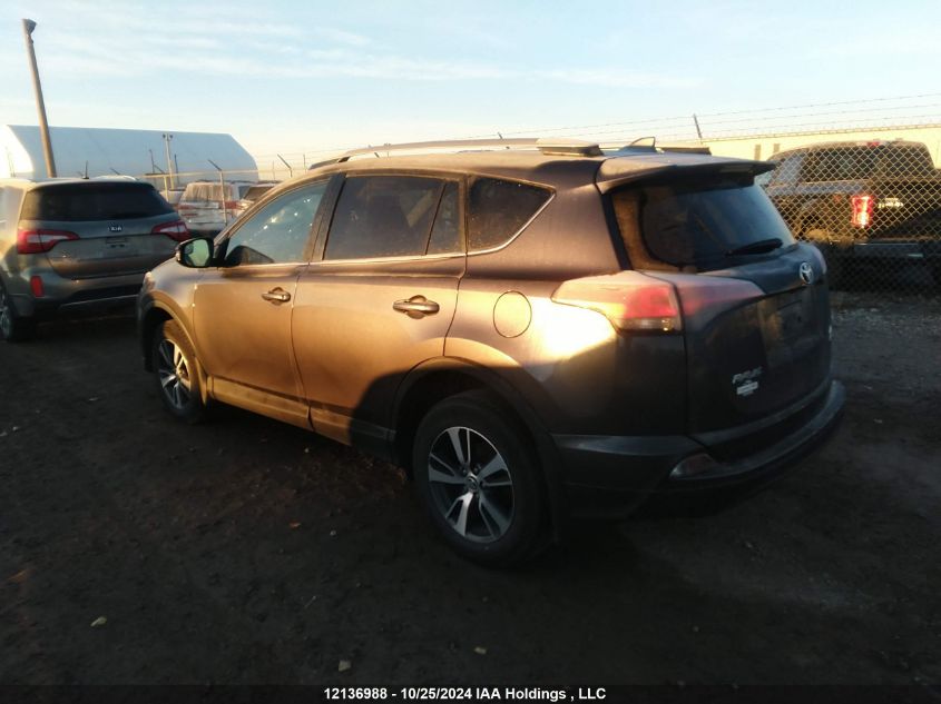 2018 Toyota Rav4 Le VIN: 2T3BFREVXJW697111 Lot: 12136988