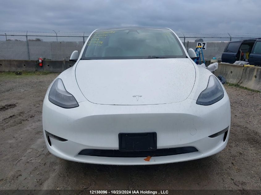 2023 Tesla Model Y VIN: 7SAYGDEE9PF692901 Lot: 12138096